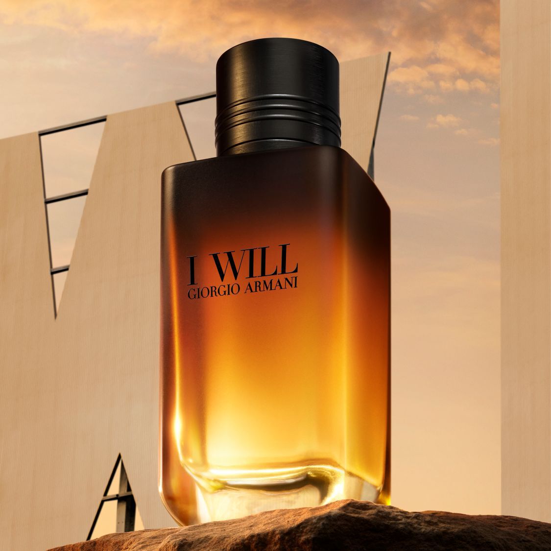 Giorgio Armani I WILL Eau de Parfum bottle in a black and gold gradient design. A warm men’s fragrance.