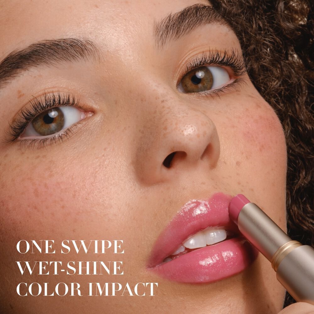 Armani Prisma Flash Sugar Flash lipstick being applied, highlighting its luminous, shimmery finish and luxurious texture.