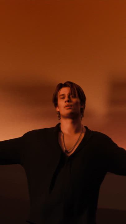 Emporio Armani 'Stronger With You' perfume ad. Features the distinctive bottle, dynamic party scenes, and intimate connections. Highlights the fragrance's allure as a man applies it, showcasing confidence. Concludes with 'Stronger With You Parfum' and 'Amber' bottles, embodying the magnetic Emporio Armani essence.​