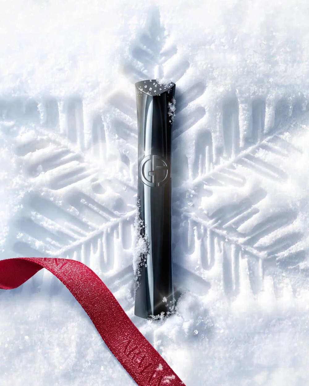 Armani beauty Vertigo Lift Mascara on snow for a winter glamour eye look.