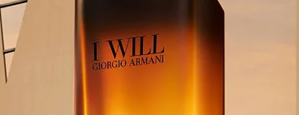 Giorgio Armani I WILL Eau de Parfum bottle in a black and gold gradient design. A warm men’s fragrance.