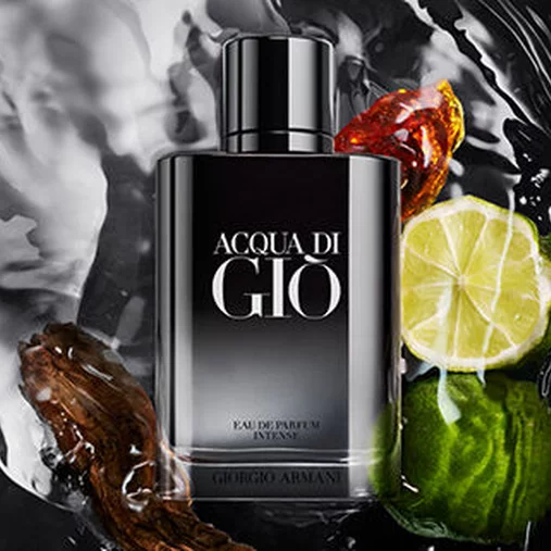 Armani fragrance bottle with bergamot, amberwood, patchouli and water elements, illustrating the blend of fresh and woody notes.