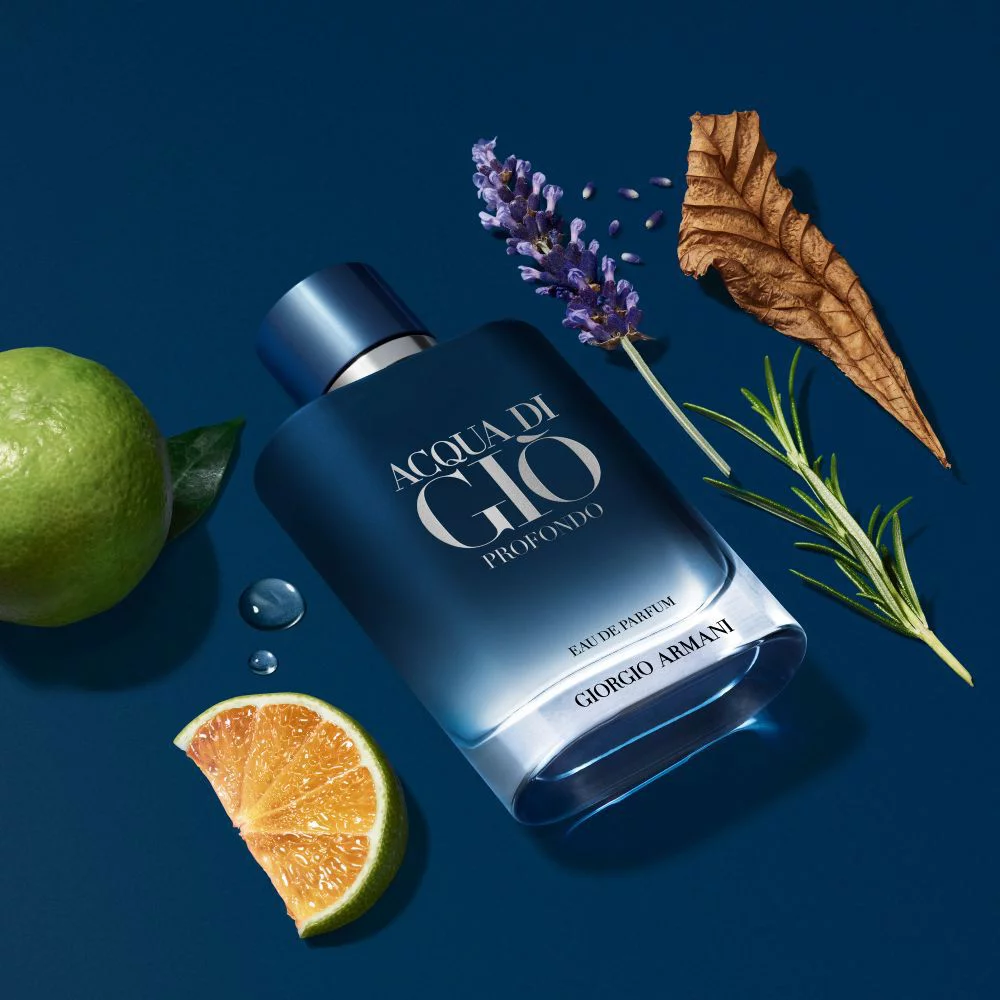 Giorgio Armani Acqua Di Gio Profondo Eau de Parfum bottle on a blue background with marine notes, green mandarin, lavandin, and rosemary.