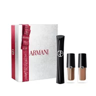 Armani beauty Holiday 2026 open white gift box with red ribbon containing Vertigo mascara and Eye Tint shades 68S Bronzy Brown and 22M Cashew, white background.