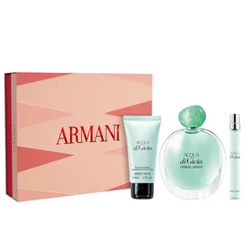 ACQUA DI GIOIA EAU DE PARFUM 100ml, ACQUA DI GIOIA EAU DE PARFUM 10ml and PERFUMED BODY LOTION next to a Spring gift set box on a white background.