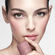 Vittoria applying ARMANI Beauty  DOLCI BLUSH pink cheek tint to the cheeks