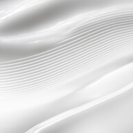 Close-up of textured white CREMA NERA Sheer Cream.