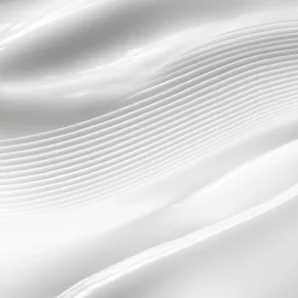 Close-up of textured white CREMA NERA Sheer Cream.