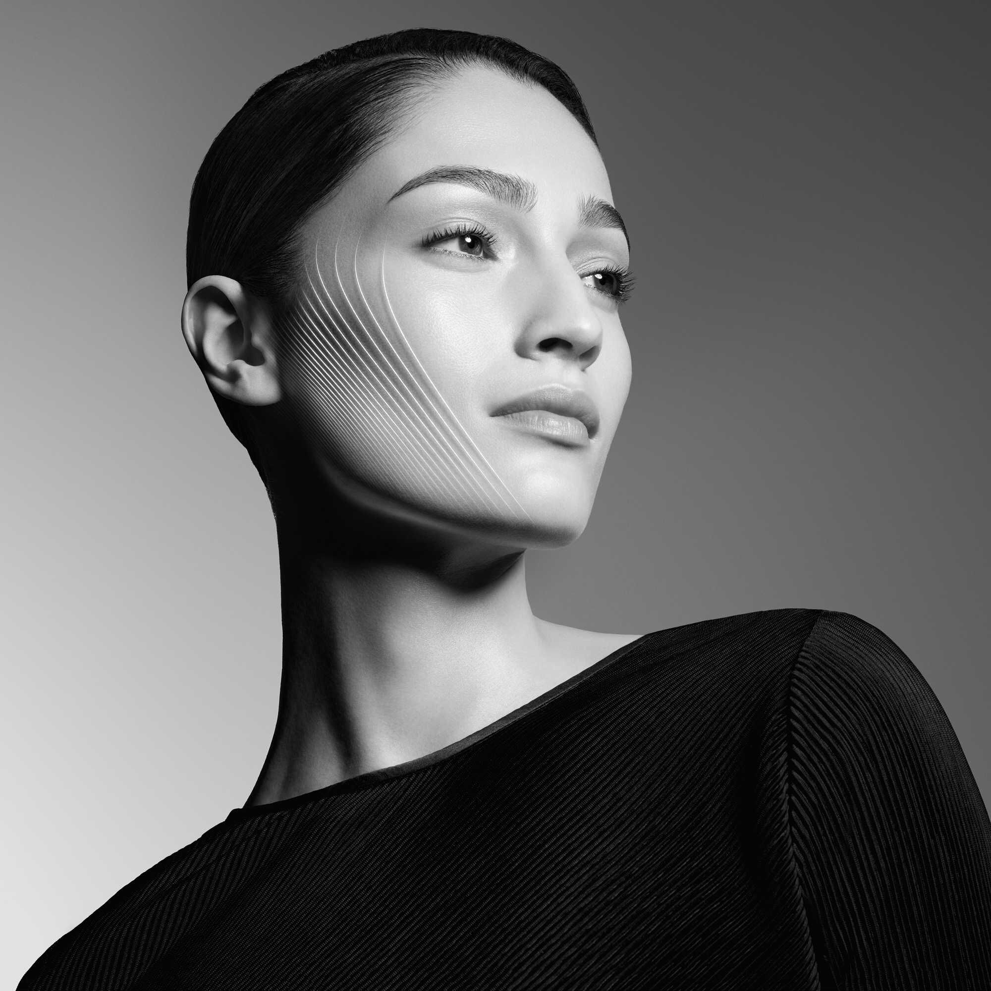 Black and white portrait of a woman with white lines defining her face.